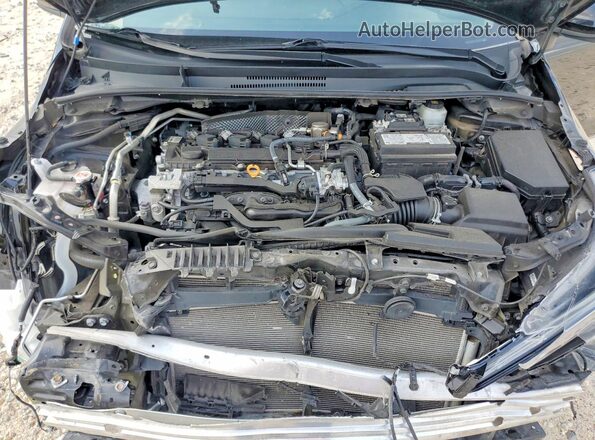 5YFS4MCE2RP205477 2024 TOYOTA COROLLA Black Սալոնի հետևի տեսք
