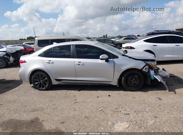 5YFS4MCE2TP260566 2026 TOYOTA COROLLA Silver Вид задньої частини салону