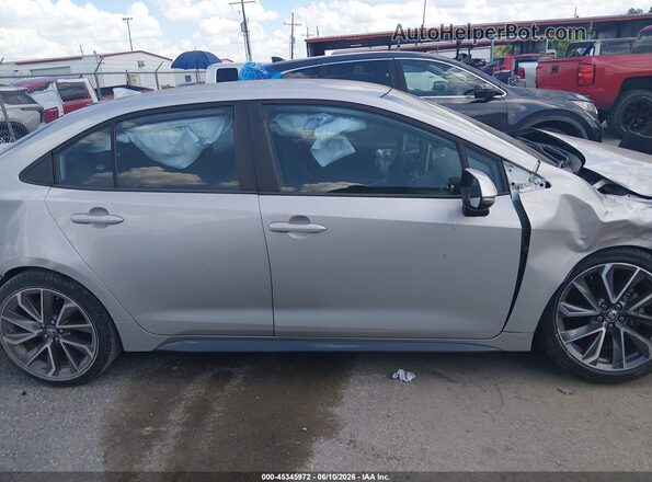 5YFS4MCE3MP078134 2021 TOYOTA COROLLA Silver Rear interior view