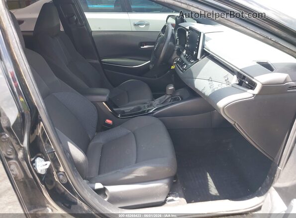5YFS4MCE5MP085716 2021 TOYOTA COROLLA Black წინა სალონის ხედი