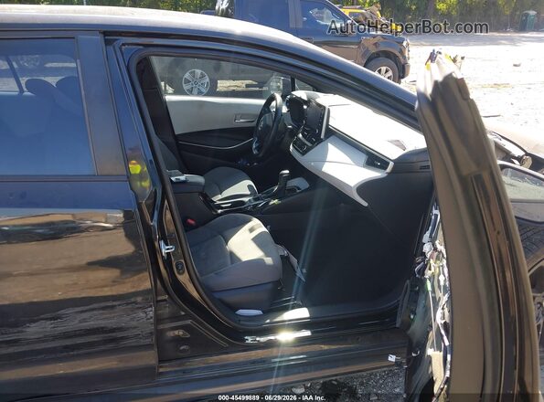 5YFS4MCE6MP074465 2021 TOYOTA COROLLA Black Вид салону спереду