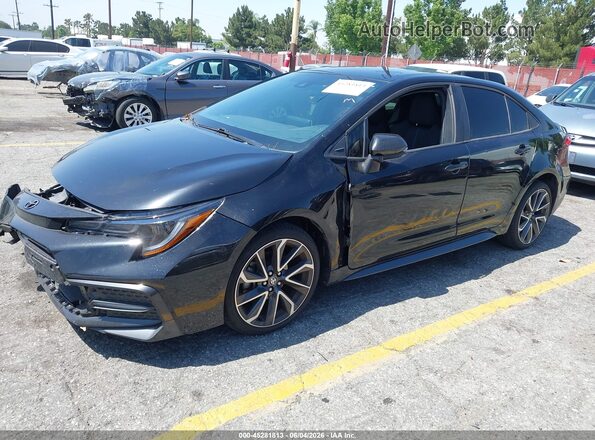5YFS4MCE6MP096188 2021 TOYOTA COROLLA Black Vista tres cuartos delantera izquierda