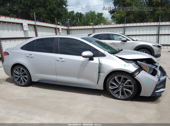 5YFS4MCE6NP115503 2022 TOYOTA COROLLA Silver Вид задньої частини салону