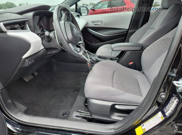 5YFS4MCE6PP158371 2023 TOYOTA COROLLA Black Front interior view
