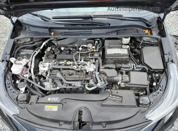 5YFS4MCE6PP158371 2023 TOYOTA COROLLA Black Rear interior view