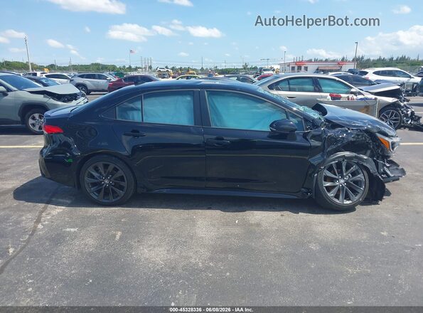 5YFS4MCE6SP222949 2025 TOYOTA COROLLA Dark Blue Widok wnętrza z tyłu