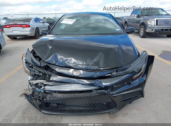 5YFS4MCE8NP121867 2022 TOYOTA COROLLA Black Widok wnętrza z tyłu