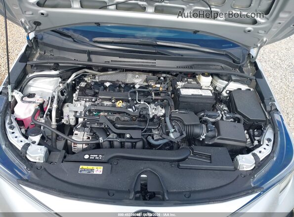 5YFS4MCE8PP154743 2023 TOYOTA COROLLA Silver Rear view