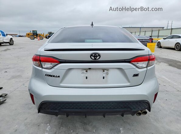 5YFS4MCE9NP139603 2022 TOYOTA COROLLA Silver Вид ззаду
