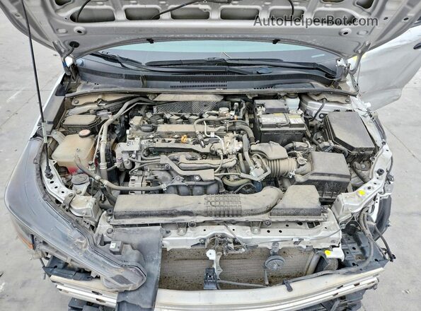 5YFS4MCE9NP139603 2022 TOYOTA COROLLA Silver Вид задньої частини салону