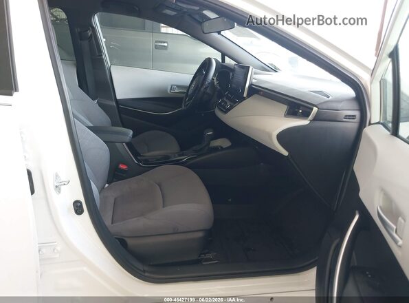 5YFS4MCEXMP090345 2021 TOYOTA COROLLA White წინა სალონის ხედი