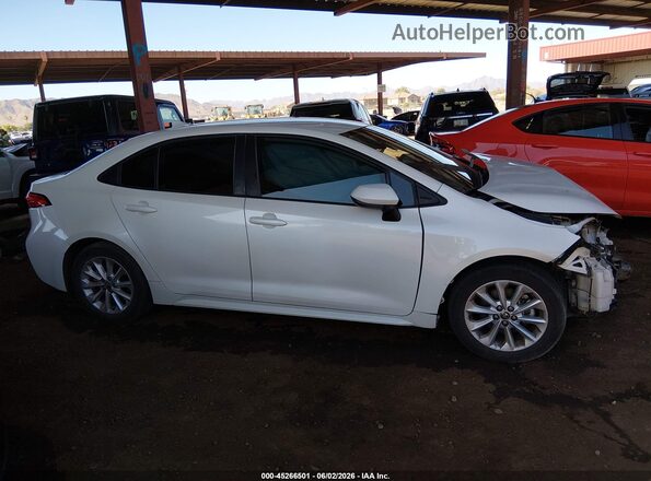 5YFVPMAE4MP169842 2021 TOYOTA COROLLA White Vista interior trasera