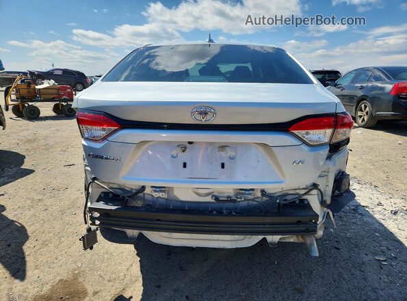 5YFVPMAE6NP385967 2022 TOYOTA COROLLA Silver უკანა ხედი