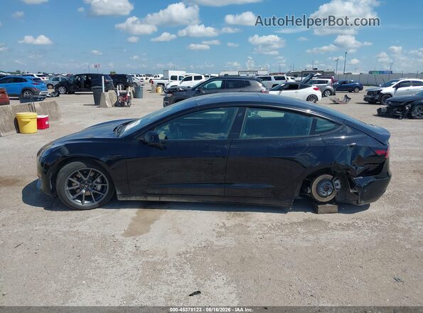 5YJ3E1EA0PF435599 2023 TESLA MODEL 3 Black Вид задньої частини салону