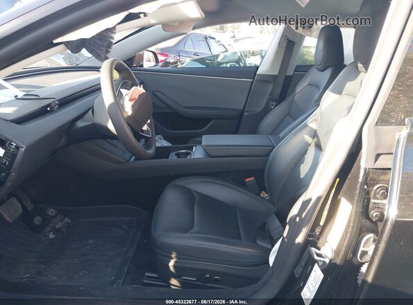 5YJ3E1EA3SF042964 2025 TESLA MODEL 3 Black Front interior view