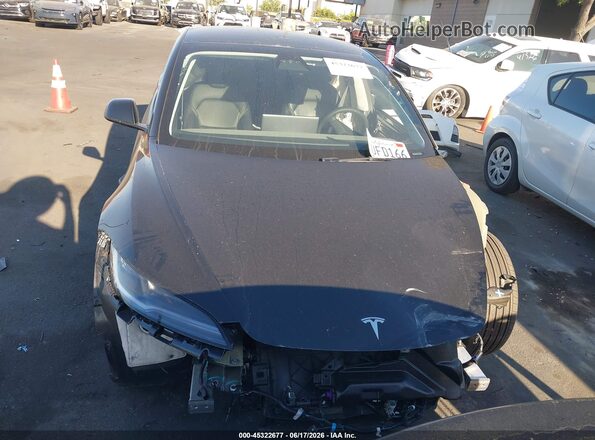 5YJ3E1EA3SF042964 2025 TESLA MODEL 3 Black Rear interior view