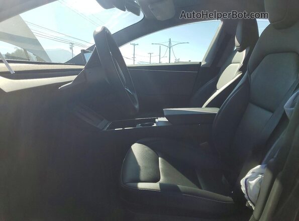 5YJ3E1EA4SF027258 2025 TESLA MODEL Charcoal Front interior view