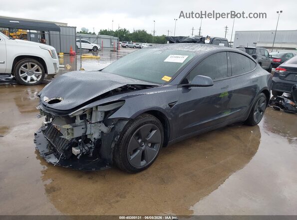 5YJ3E1EA7PF396901 2023 TESLA MODEL 3 Gray Передня ліва чверть