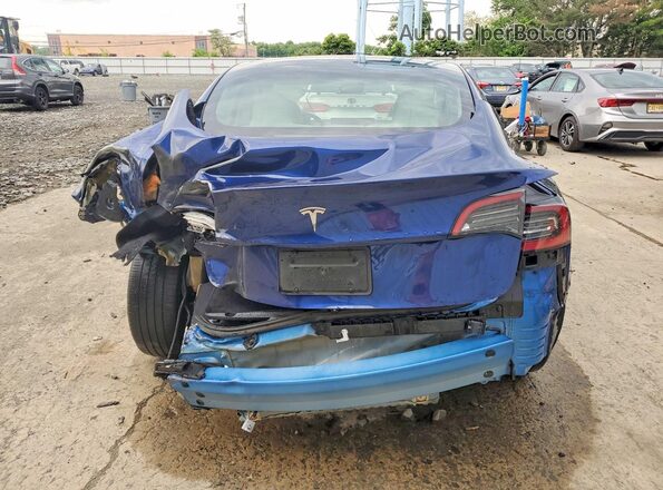 5YJ3E1EA8PF614909 2023 TESLA MODEL Blue Widok z tyłu