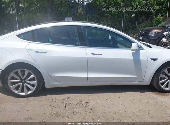 5YJ3E1EB0JF134170 2018 TESLA MODEL 3 White Widok wnętrza z tyłu