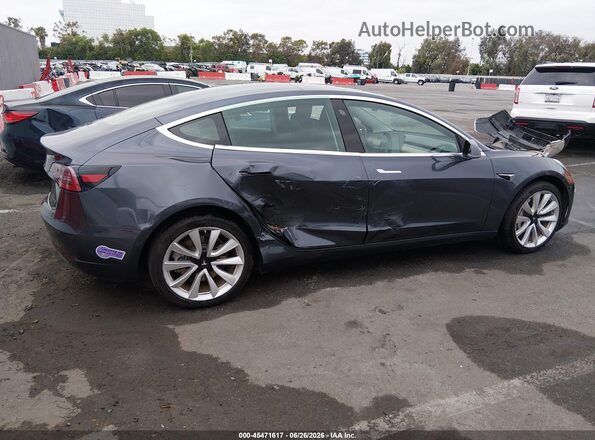 5YJ3E1EB0KF497828 2019 TESLA MODEL 3 Gray Widok wnętrza z tyłu