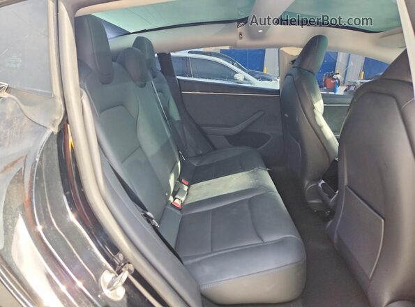 5YJ3E1EB0RF769594 2024 TESLA MODEL Black Vista de los asientos traseros