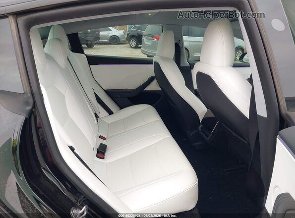 5YJ3E1EB0SF935506 2025 TESLA MODEL 3 Black VIN կոդի պիտակի տեսք