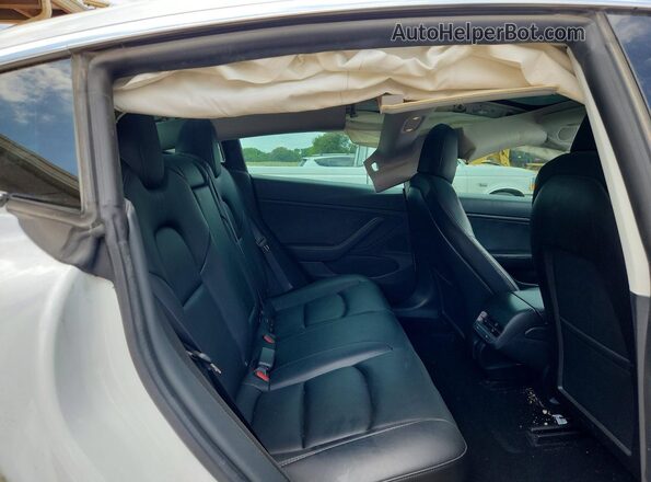 5YJ3E1EB2LF665339 2020 TESLA MODEL White Rear seats view