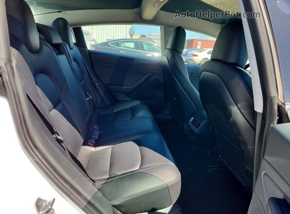 5YJ3E1EB2MF855191 2021 TESLA MODEL White Rear seats view