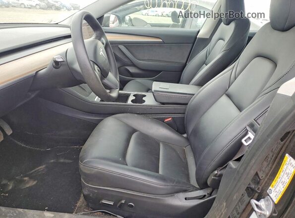 5YJ3E1EB2PF673544 2023 TESLA MODEL Black Front interior view