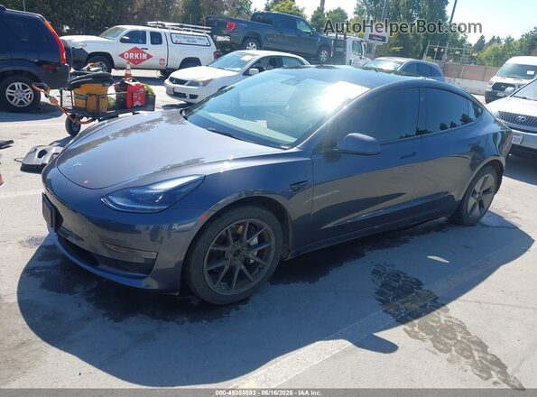 5YJ3E1EB2PF689064 2023 TESLA MODEL 3 Gray წინა მარცხენა ხედი სამი მეოთხედიდან