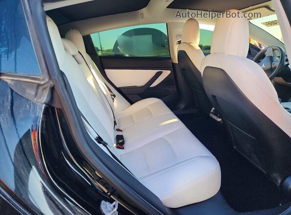 5YJ3E1EB3KF213950 2019 TESLA MODEL Black Vista de los asientos traseros