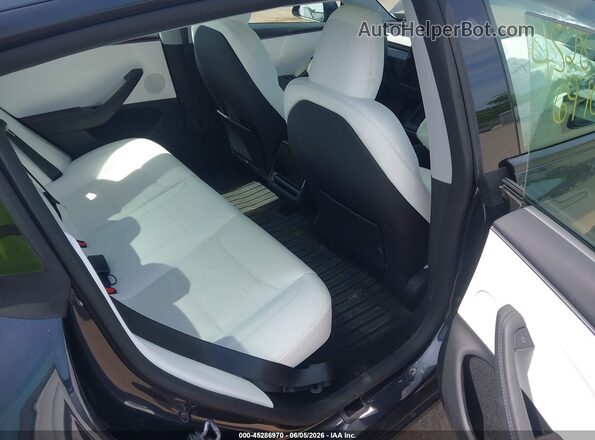 5YJ3E1EB3TF131640 2026 TESLA MODEL 3 Black VIN კოდის სტიკერის ხედი