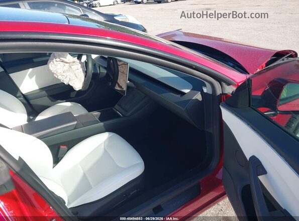 5YJ3E1EB4RF813502 2024 TESLA MODEL 3 Red Widok wnętrza z przodu