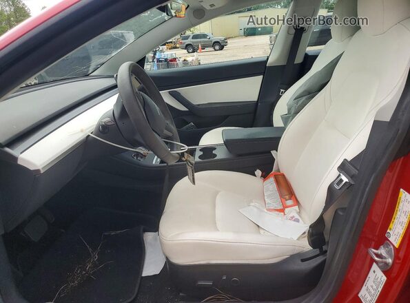 5YJ3E1EB7MF917989 2021 TESLA MODEL Red Vista interior delantera