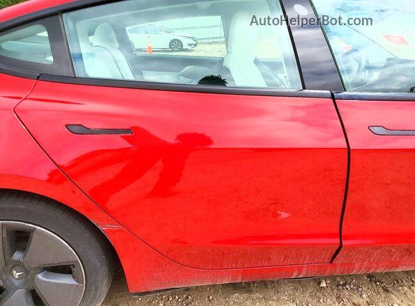 5YJ3E1EB7MF917989 2021 TESLA MODEL Red Vista de los asientos traseros