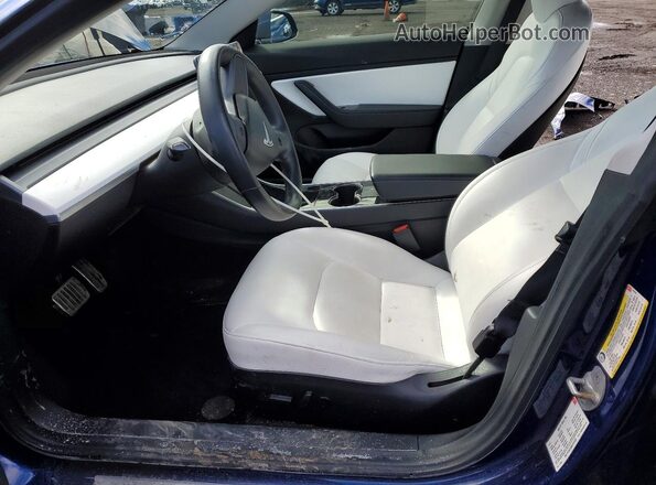 5YJ3E1EB8JF147670 2018 TESLA MODEL Blue Front interior view