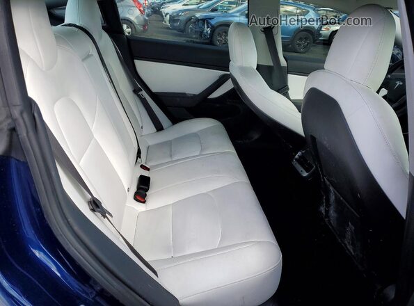 5YJ3E1EB8JF147670 2018 TESLA MODEL Blue Rear seats view
