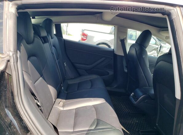 5YJ3E1EB9JF127671 2018 TESLA MODEL Black Հետևի նստատեղերի տեսք