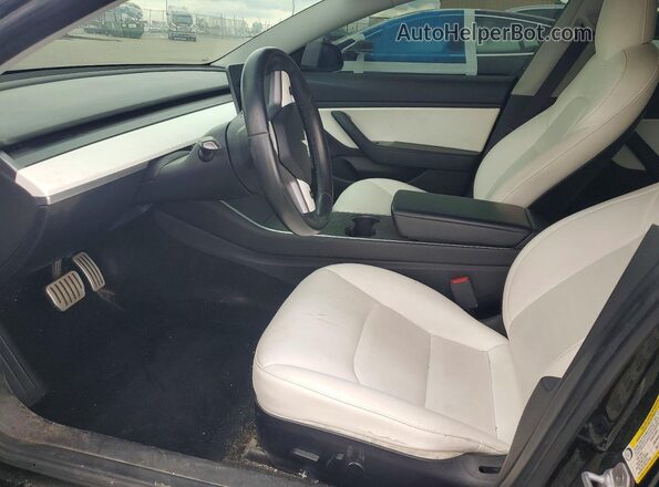 5YJ3E1EB9KF231756 2019 TESLA MODEL Black Front interior view