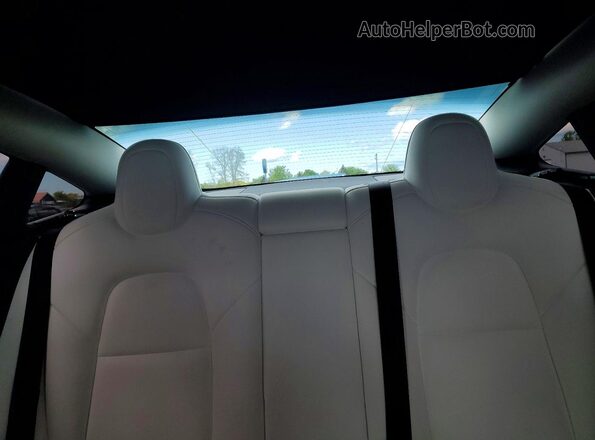 5YJ3E1EB9NF110908 2022 TESLA MODEL White Rear seats view