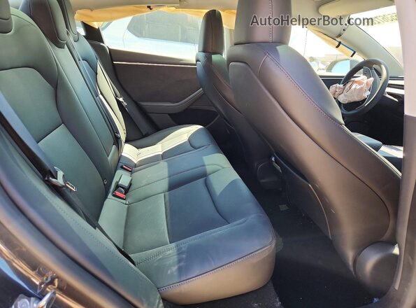 5YJ3E1EB9RF794722 2024 TESLA MODEL Gray Vista de los asientos traseros