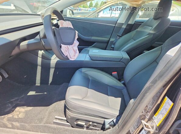 5YJ3E1EB9RF794722 2024 TESLA MODEL Gray Vista interior delantera