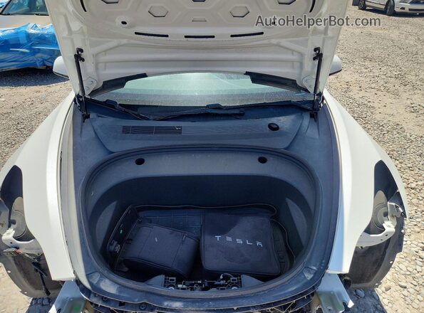 5YJ3E1EC3MF059669 2021 TESLA MODEL White Rear interior view