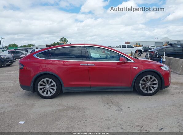 5YJXCBE24GF006312 2016 TESLA MODEL X Red Rear interior view