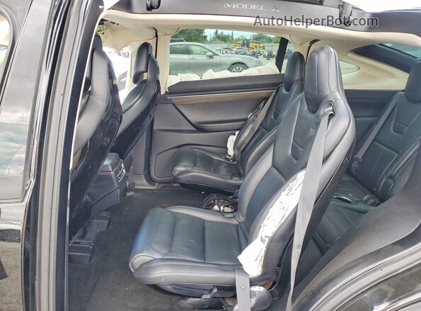 5YJXCBE27GF008717 2016 TESLA MODEL Black Rear interior view