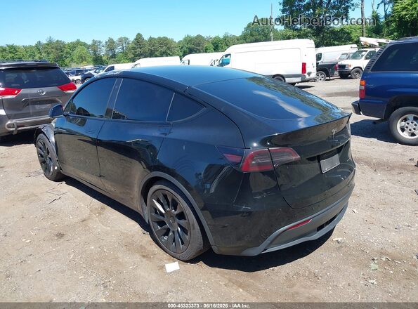 5YJYGAEE1MF143992 2021 TESLA MODEL Y Черный Вид задней части салона