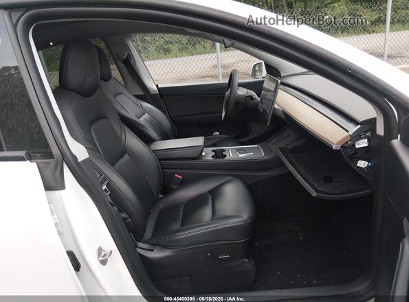 5YJYGDED9MF192785 2021 TESLA MODEL Y White Front interior view