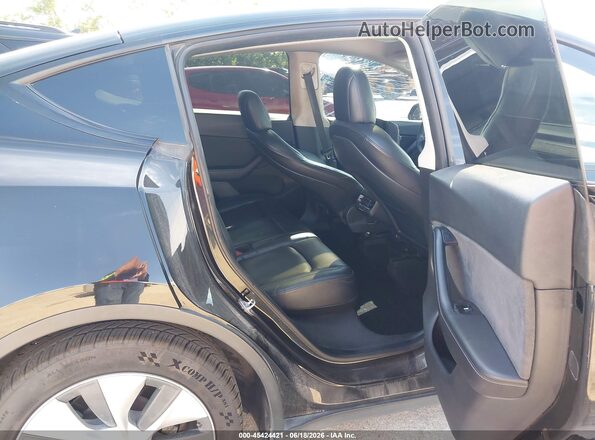 5YJYGDEE1MF258528 2021 TESLA MODEL Y Black VIN კოდის სტიკერის ხედი