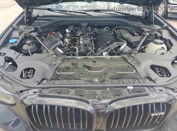 5YM23EC09R9U27444 2024 BMW X4 Black Rear interior view
